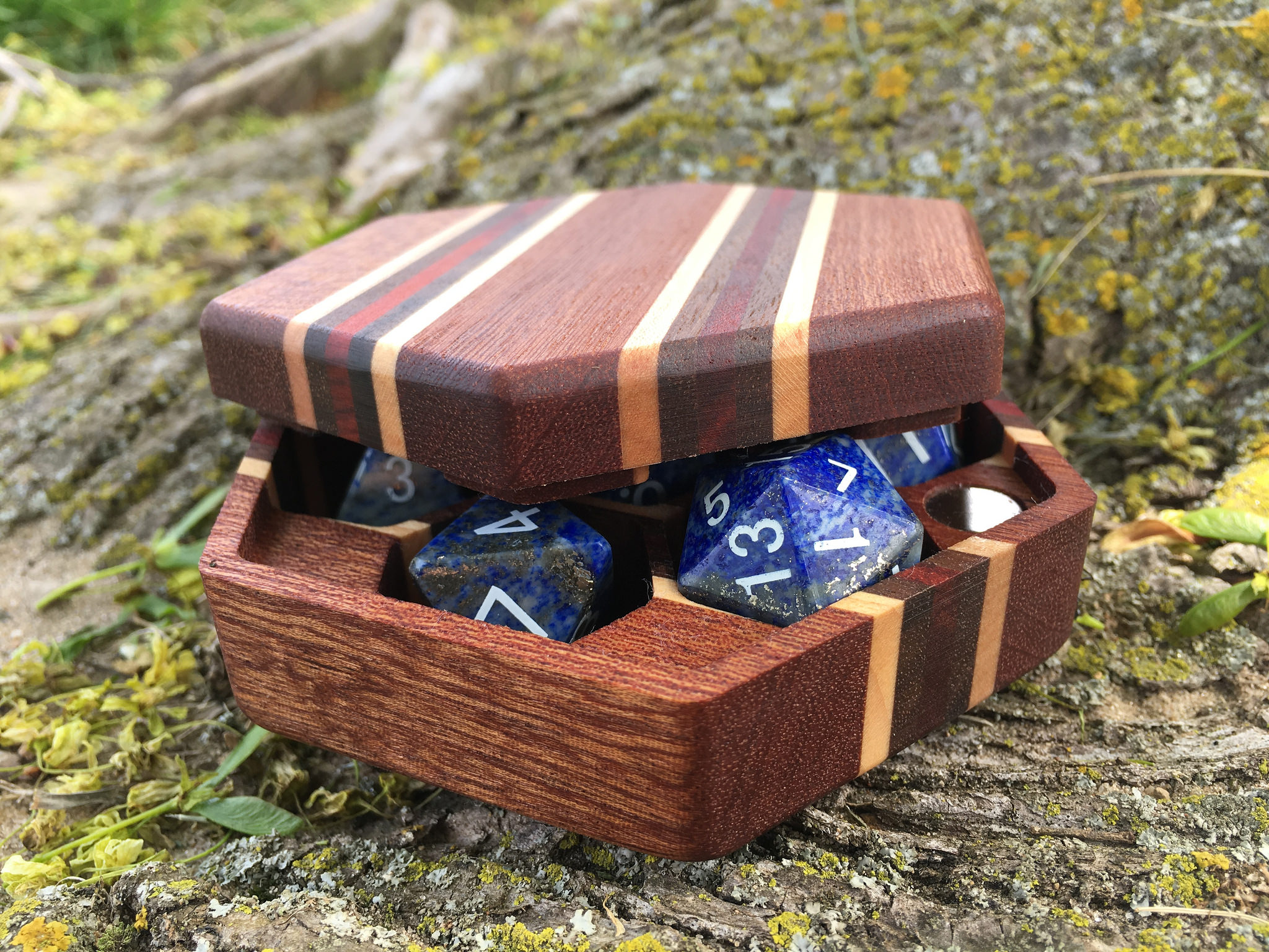 Wooden pinstripe Hex Chest dice box with lapis dice