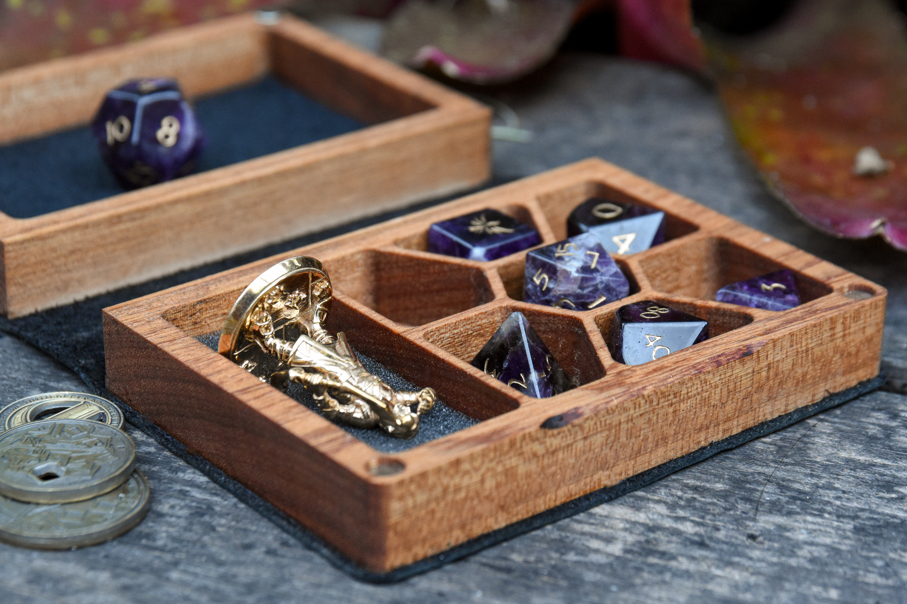 Interior of Mini Spellbook mini dice box for D&D and tabletop gaming with gemstone dice and miniature