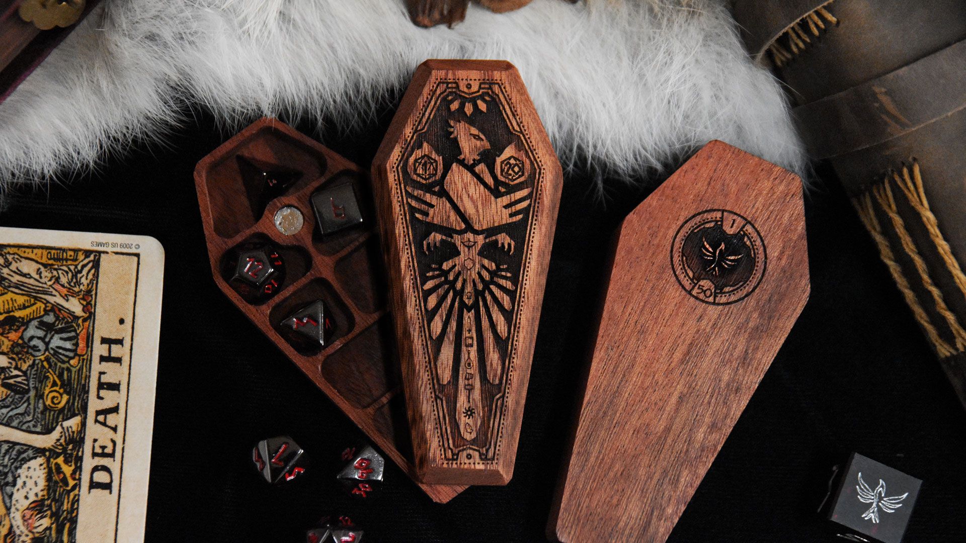 Limited Edition Mini Sarcophagi shaped dice boxes made of wood, holding a set of RPG dice