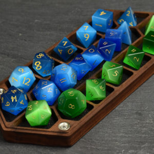 The Rupee Hex Chest dice box has 14 dice slots or two sets of dice, and a long center slot that can fit a extra dice set for a total of 3 sets of dice.